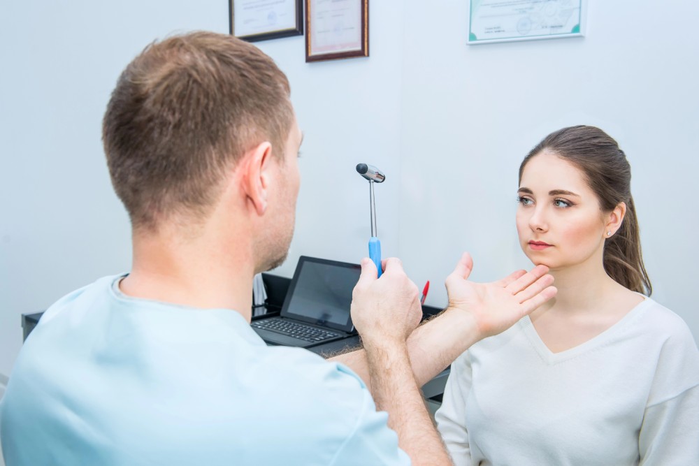 A female patient receiving a neurological exam as part of dizziness treatment near Custer, Blue Bell, Pennsylvania.