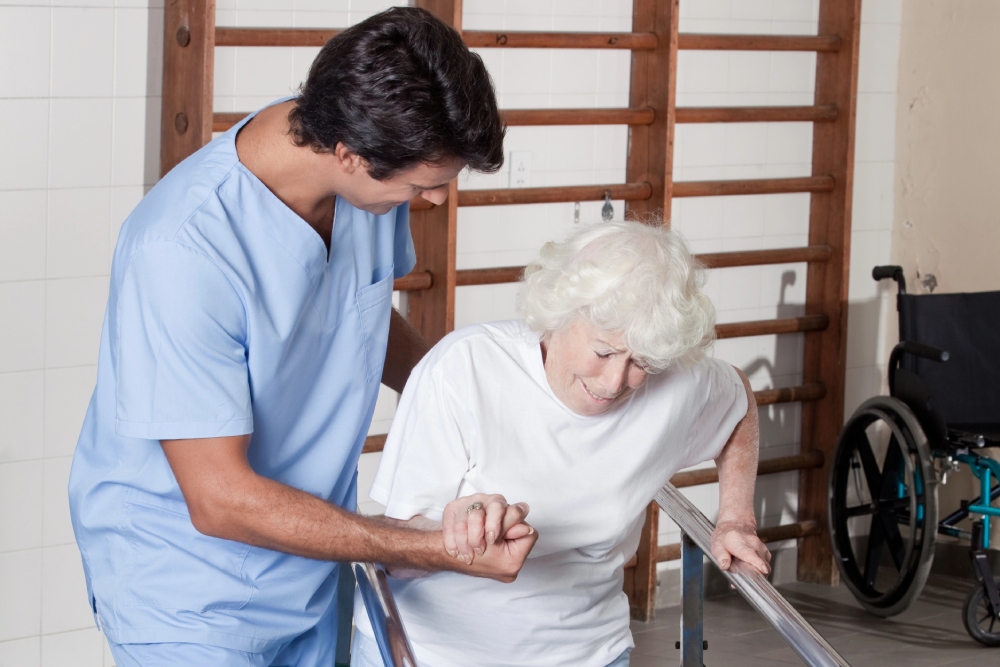 A physical therapist assisting an elderly woman with BPPV treatment near Center Square, Blue Bell, Pennsylvania.